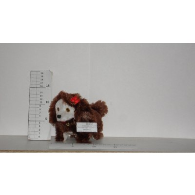 Игрушка муз. Собака с бантиком \67CL-B-424\4-358\  \140
